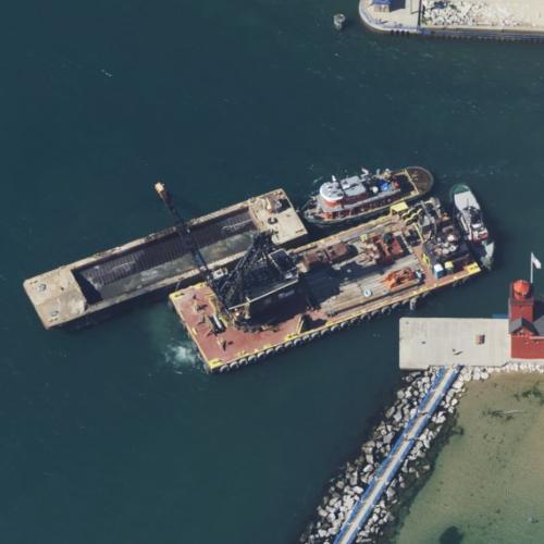 Tugs and barge (Macatawa canal) in Holland, MI (Google Maps)